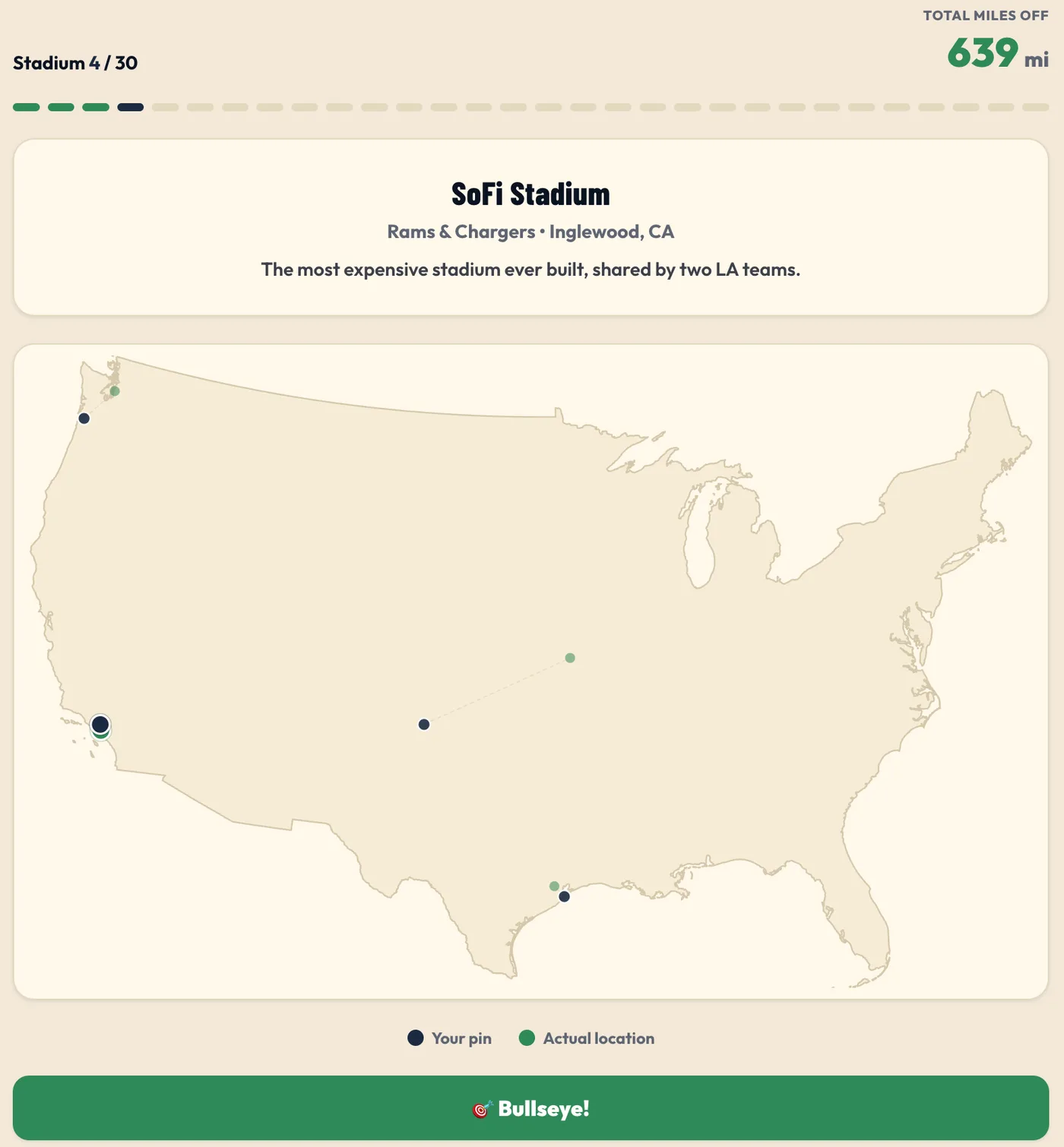 A stadium geography round with a pin dropped on a blank US map for SoFi Stadium